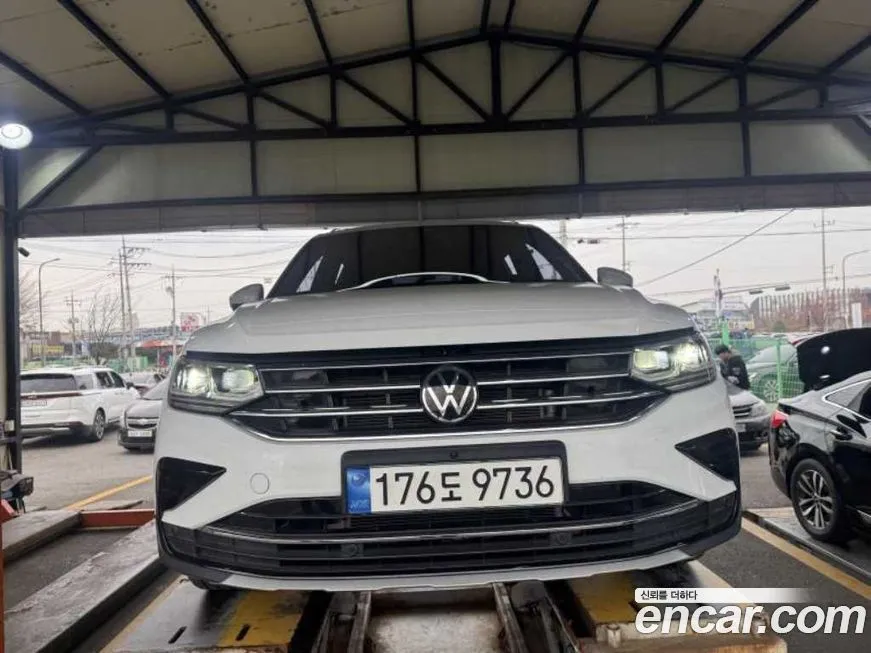 Volkswagen Tiguan — фото 1
