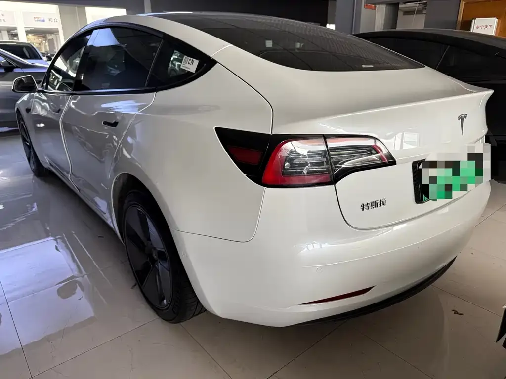 Tesla Model 3 — фото 5