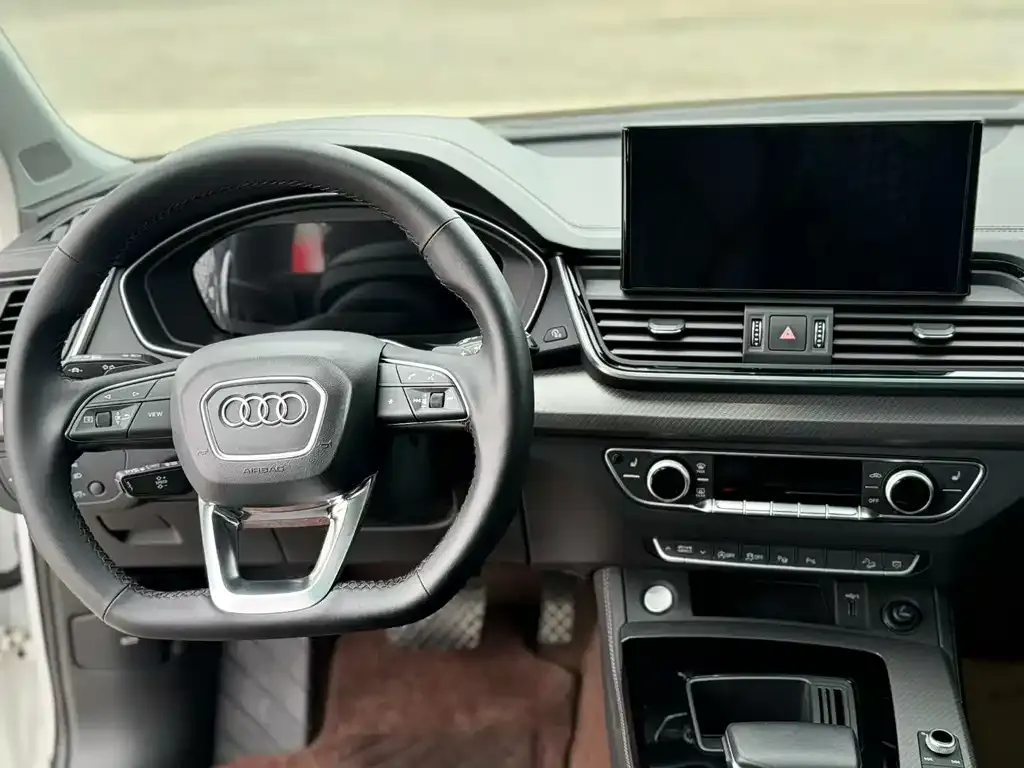 Audi Q5L — фото 8