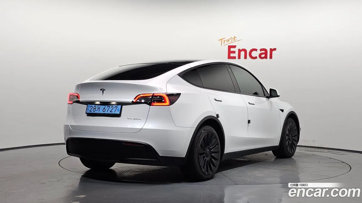 Tesla Model Y — фото 2