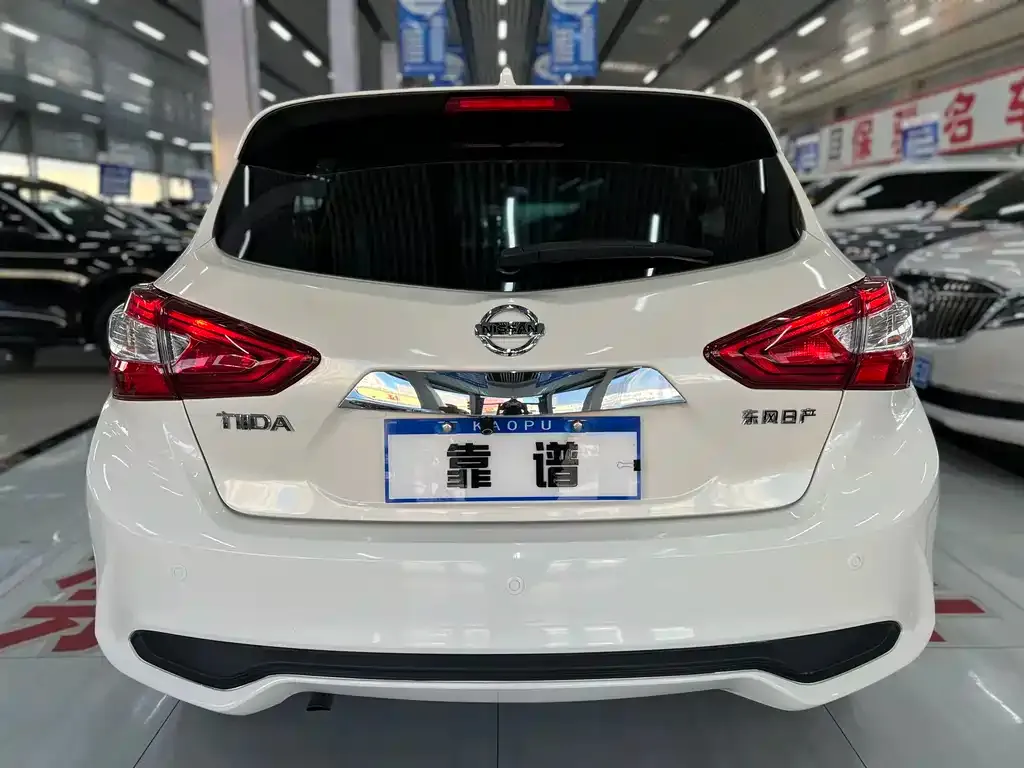 Nissan Tiida — фото 8