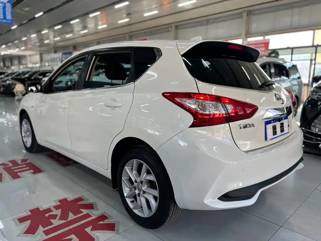 Nissan Tiida — фото 9
