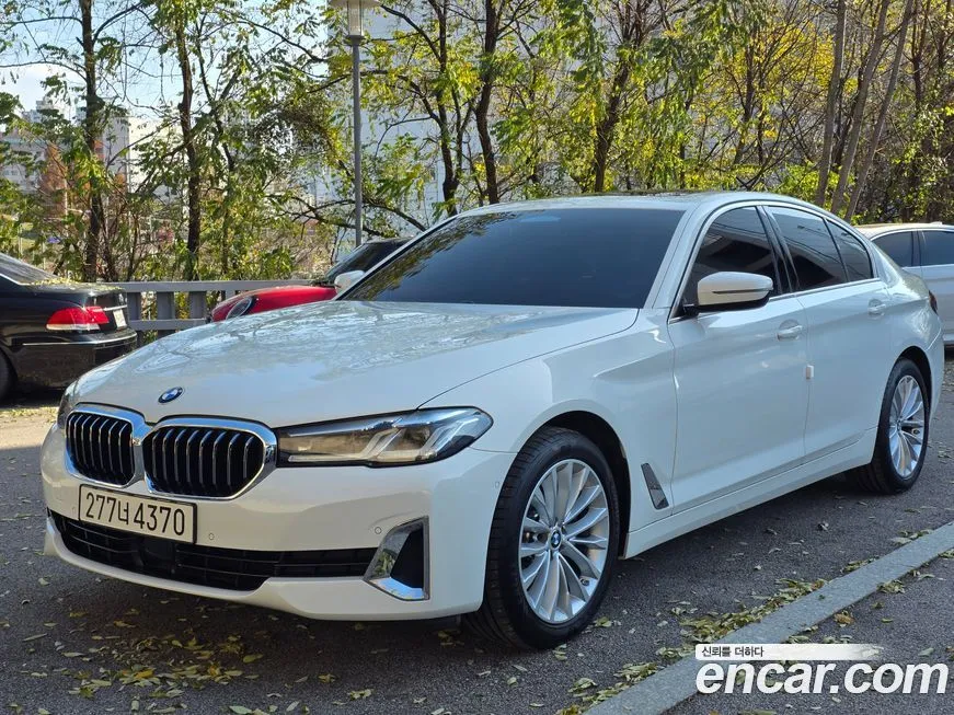 BMW 5-Series — фото 1