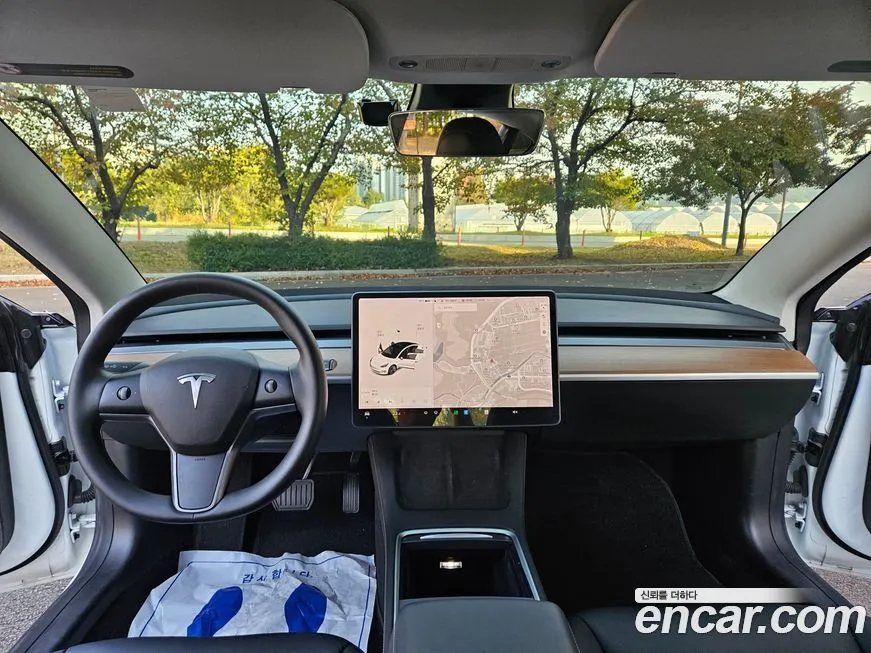 Tesla Model 3 — фото 10