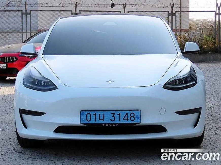 Tesla Model 3 — фото 1