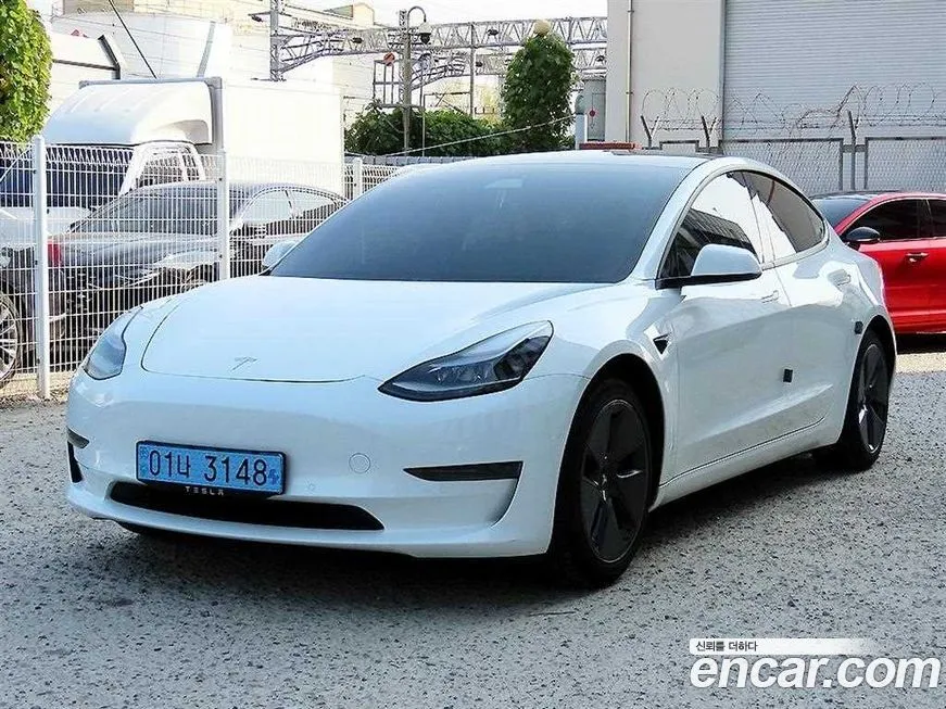Tesla Model 3 — фото 2