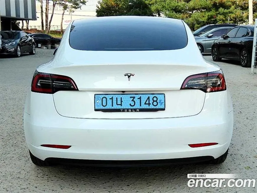 Tesla Model 3 — фото 4
