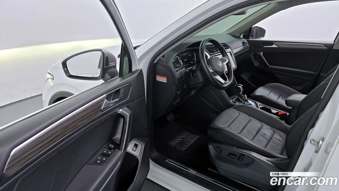 Volkswagen Tiguan — фото 10