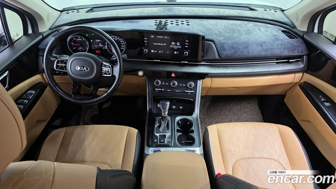 Kia Carnival — фото 7