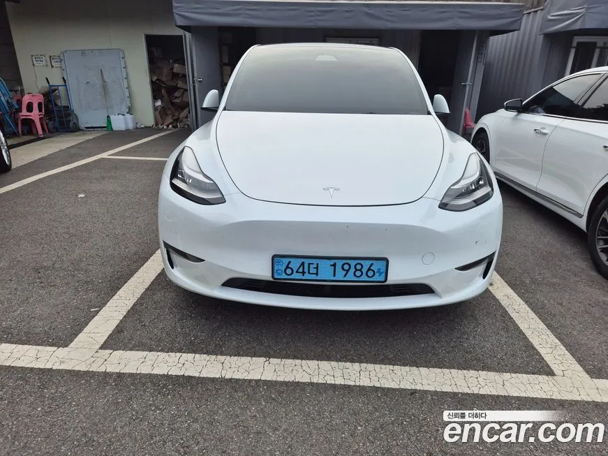 Tesla Model Y — фото 1