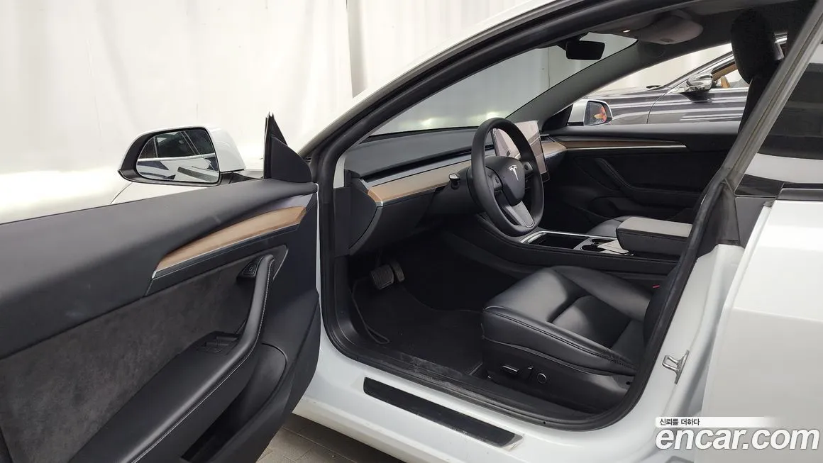 Tesla Model 3 — фото 10
