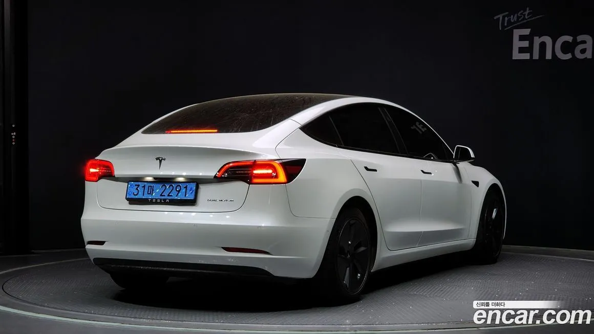 Tesla Model 3 — фото 2