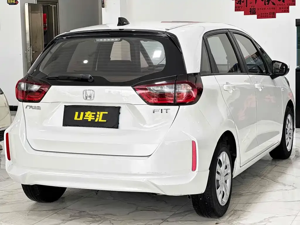 Honda Fit — фото 7