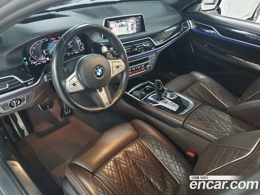 BMW 7-Series — фото 10