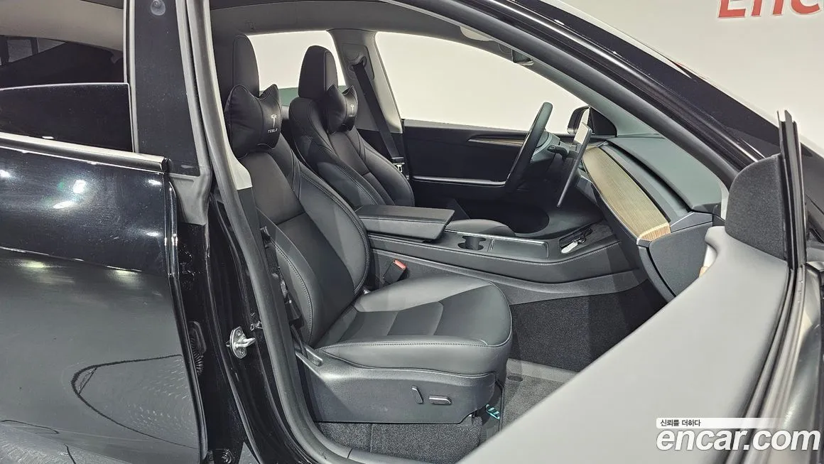 Tesla Model Y — фото 10