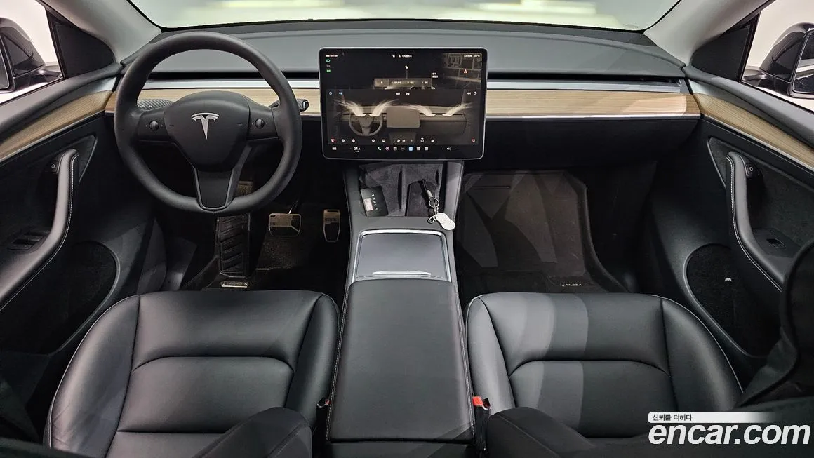 Tesla Model Y — фото 7