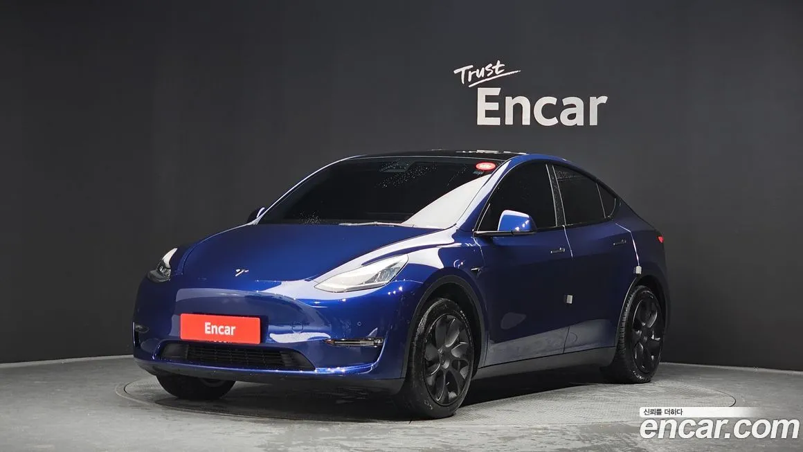 Tesla Model Y — фото 1
