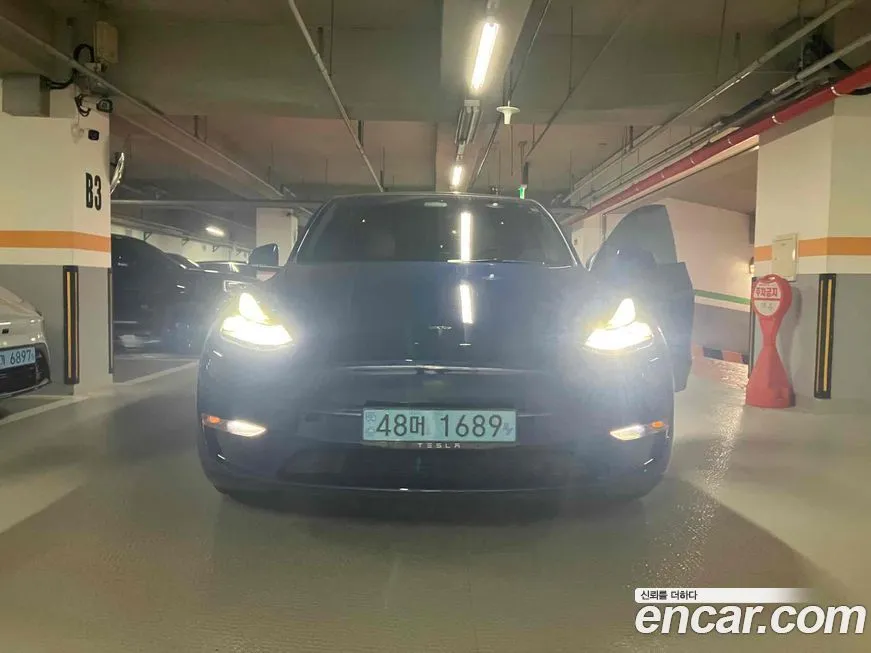 Tesla Model Y — фото 1