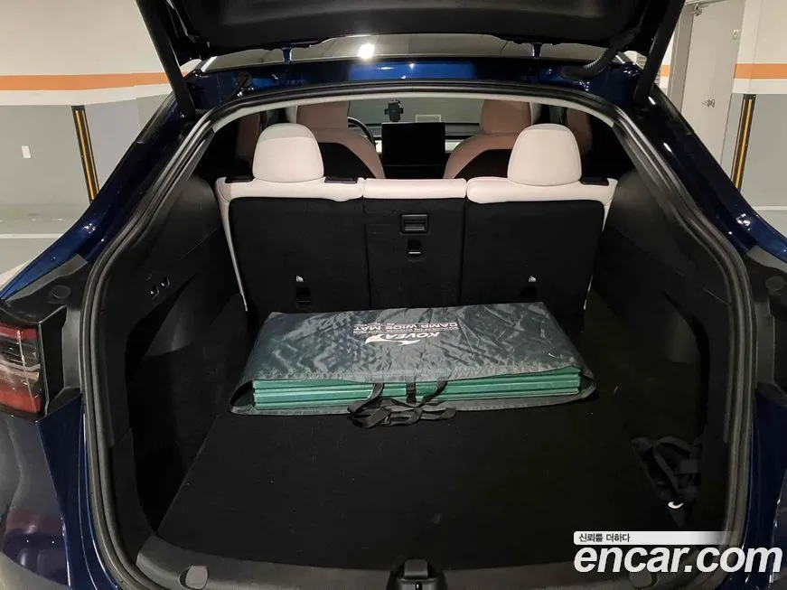 Tesla Model Y — фото 10