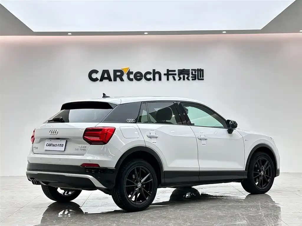 Audi Q2L — фото 5