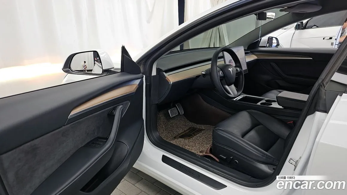 Tesla Model 3 — фото 10