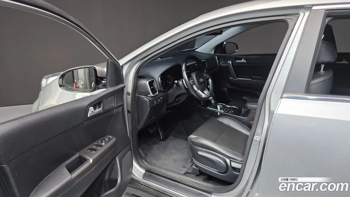Kia Sportage — фото 10