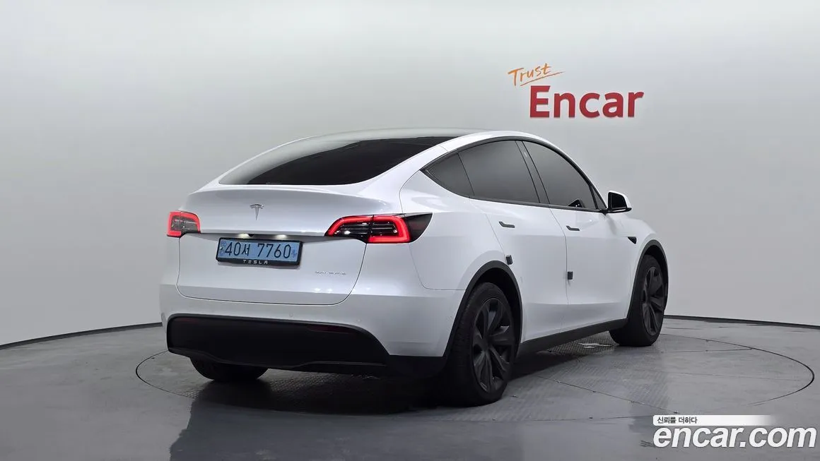 Tesla Model Y — фото 2