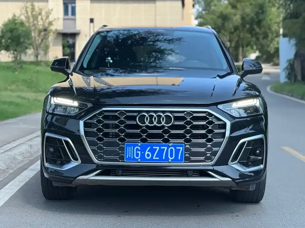 Audi Q5L — фото 5