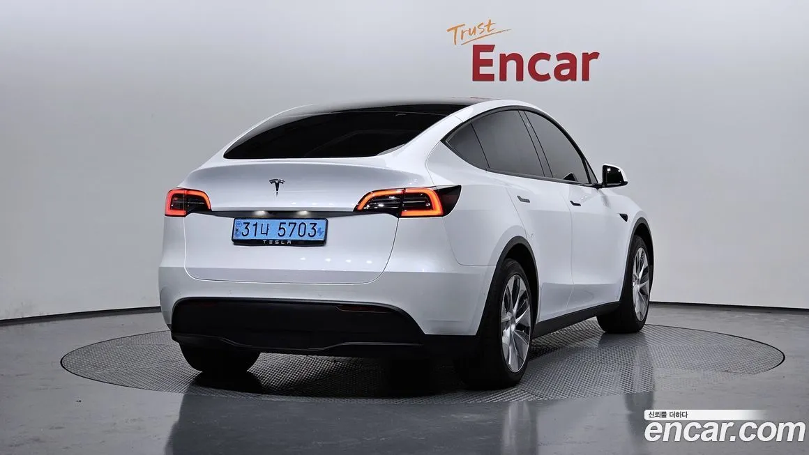 Tesla Model Y — фото 2