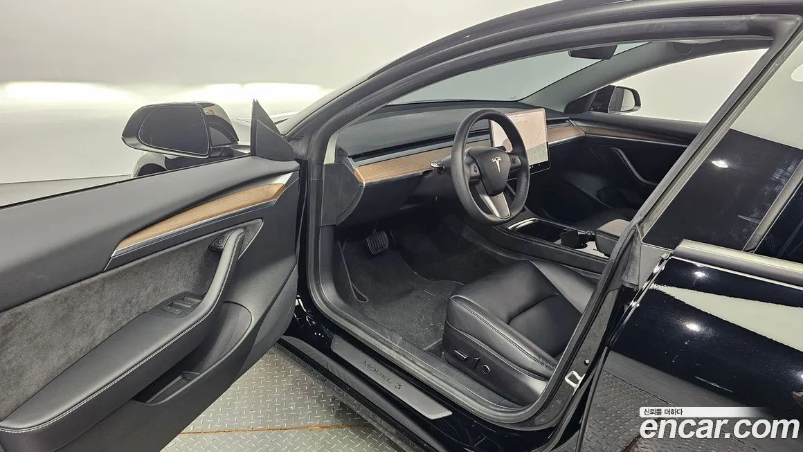 Tesla Model 3 — фото 10