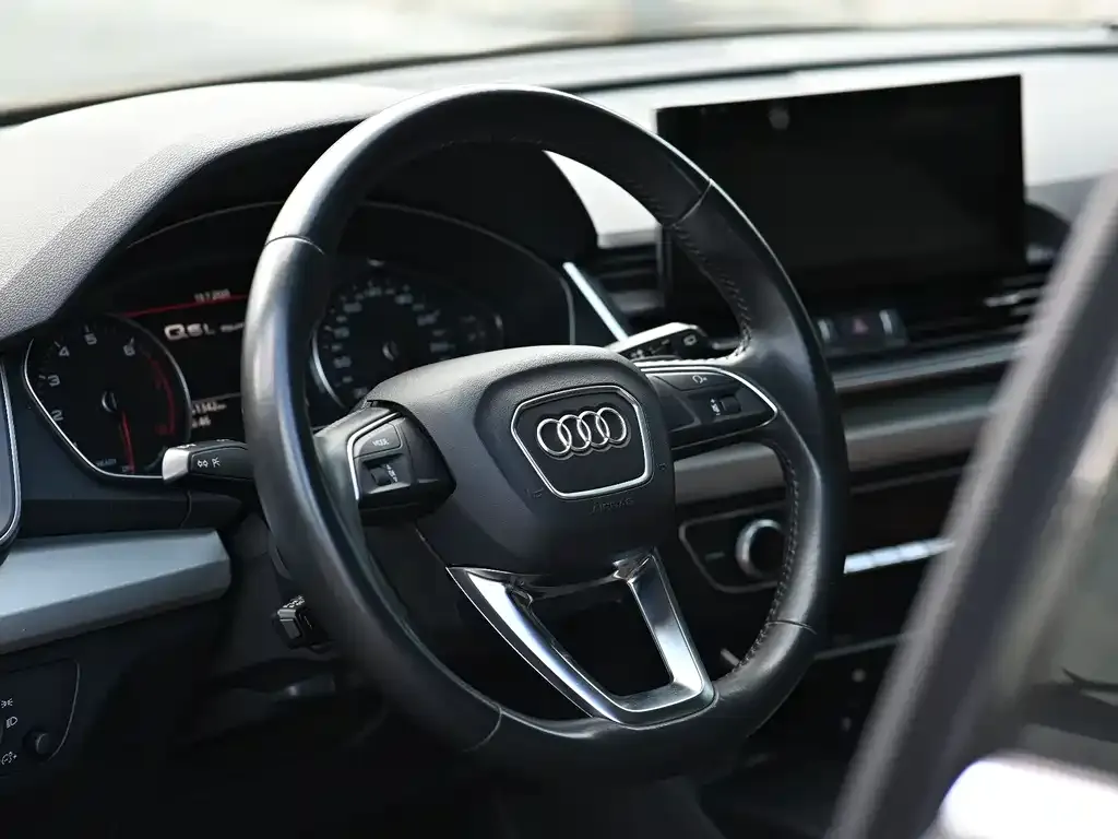 Audi Q5L — фото 7