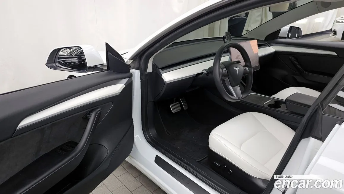 Tesla Model 3 — фото 10
