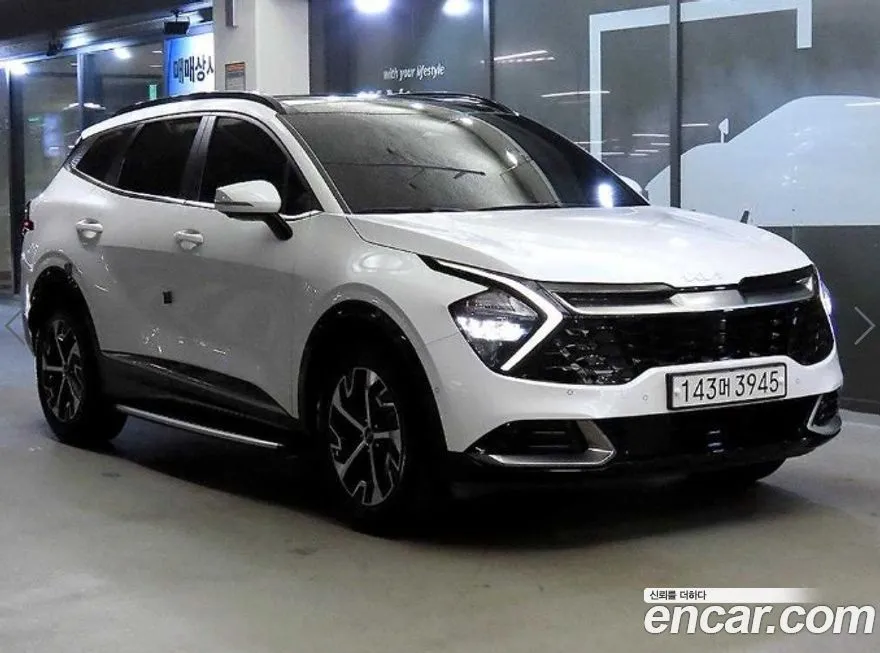 Kia Sportage — фото 1