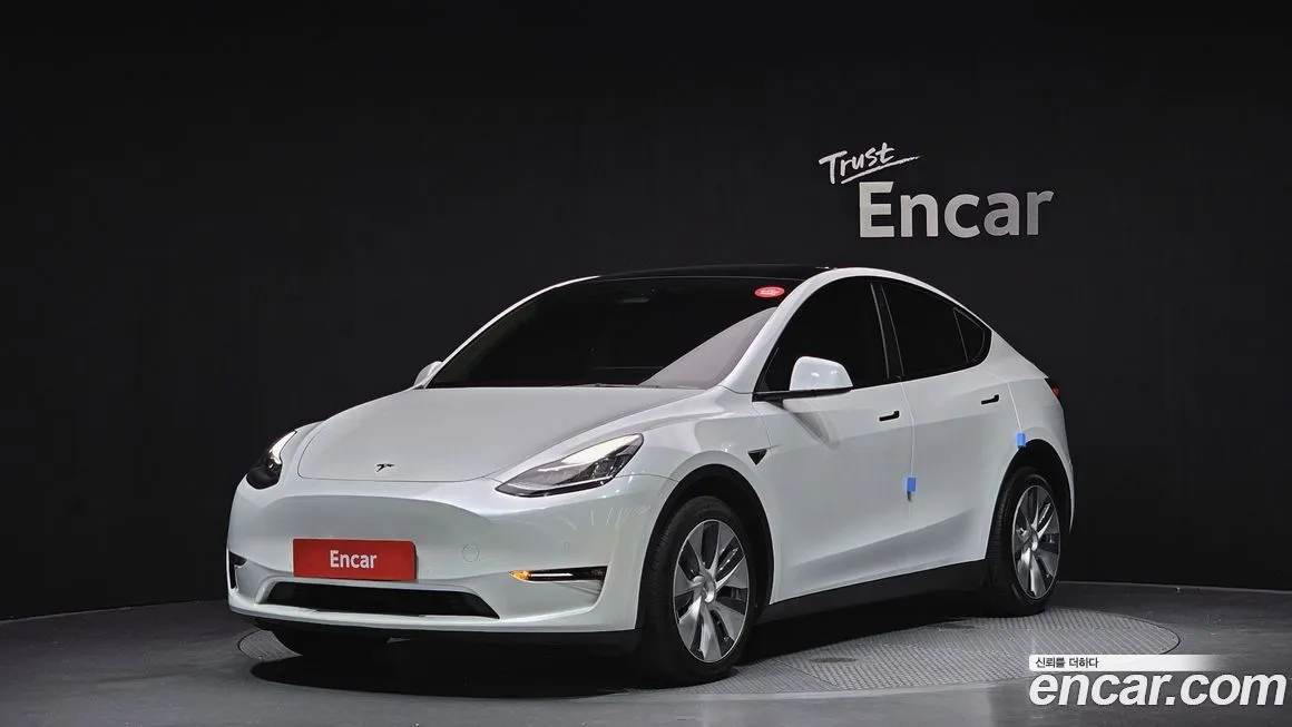 Tesla Model Y — фото 1