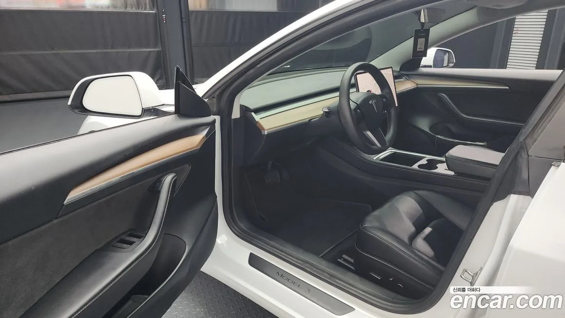 Tesla Model 3 — фото 10