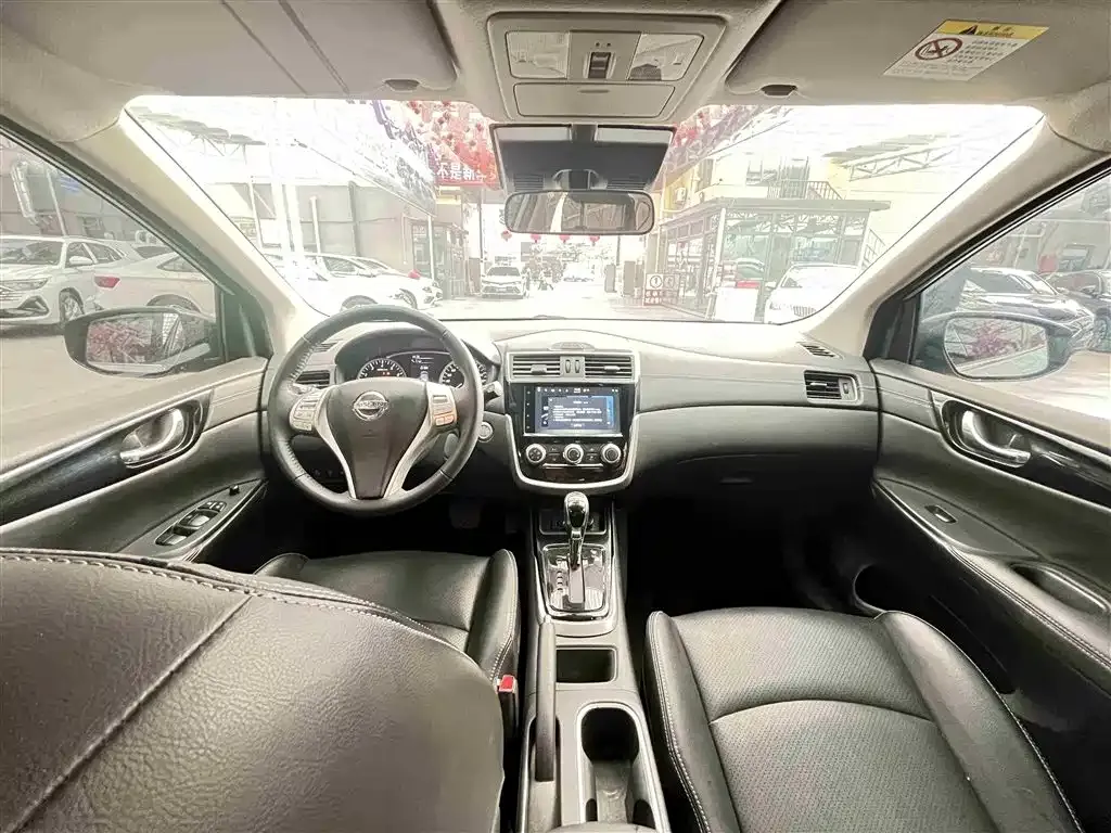 Nissan Tiida — фото 9