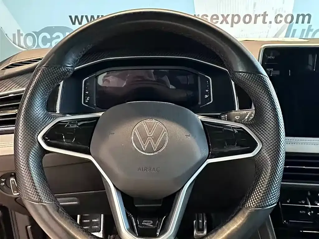 Volkswagen Tiguan L — фото 10
