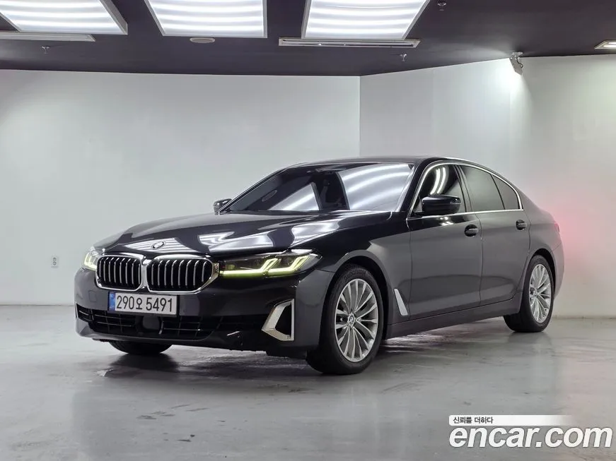 BMW 5-Series — фото 1