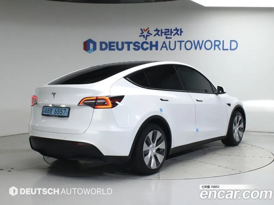 Tesla Model Y — фото 2