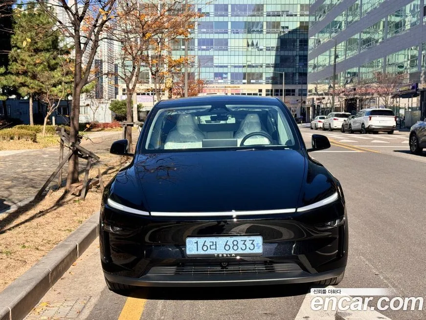 Tesla Model Y — фото 1