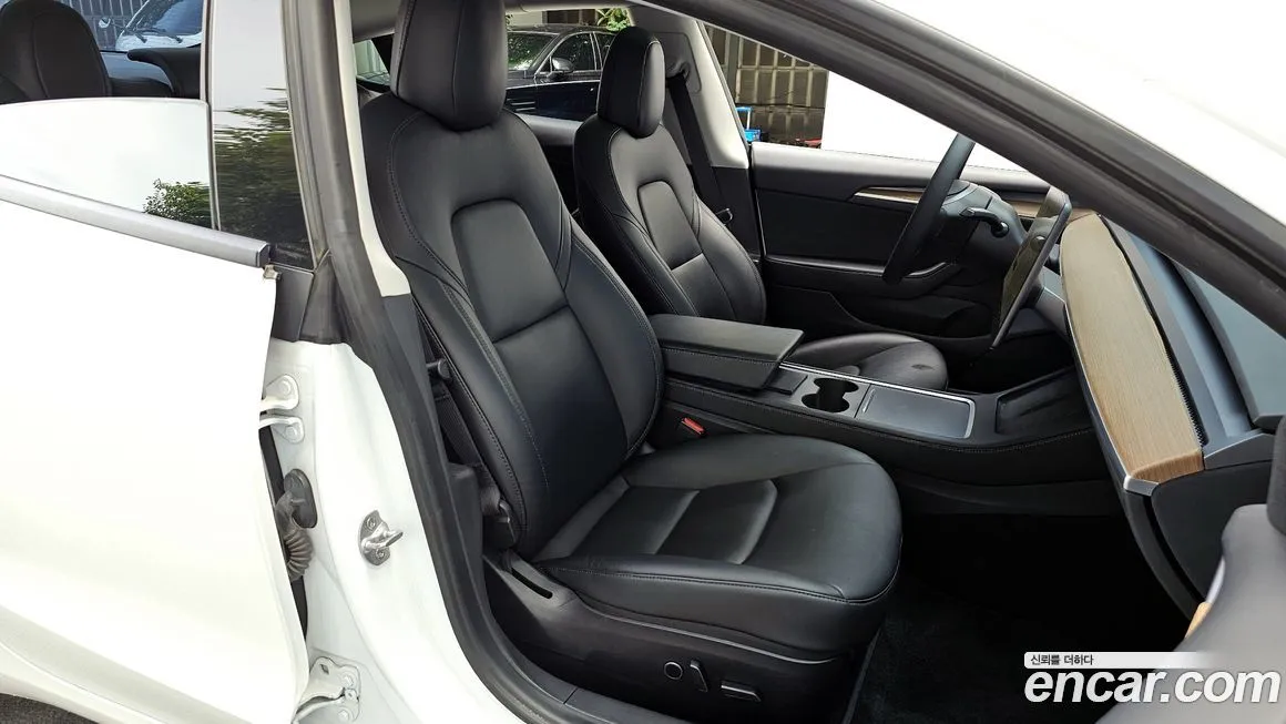 Tesla Model 3 — фото 10