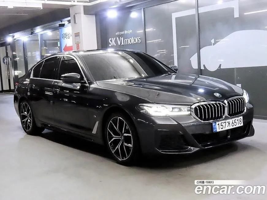 BMW 5-Series — фото 1