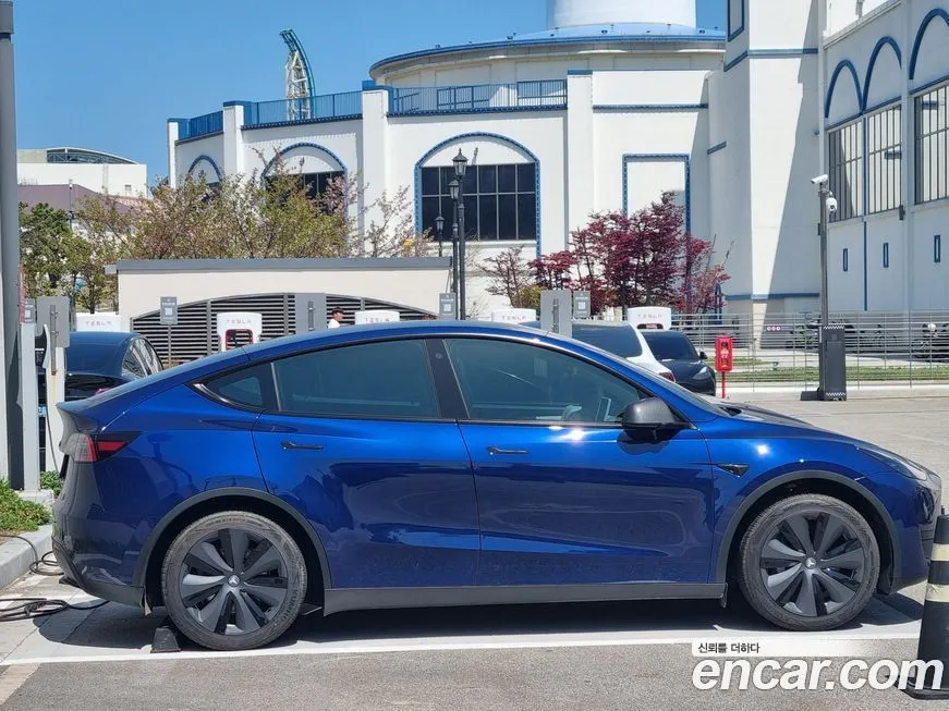 Tesla Model Y — фото 9