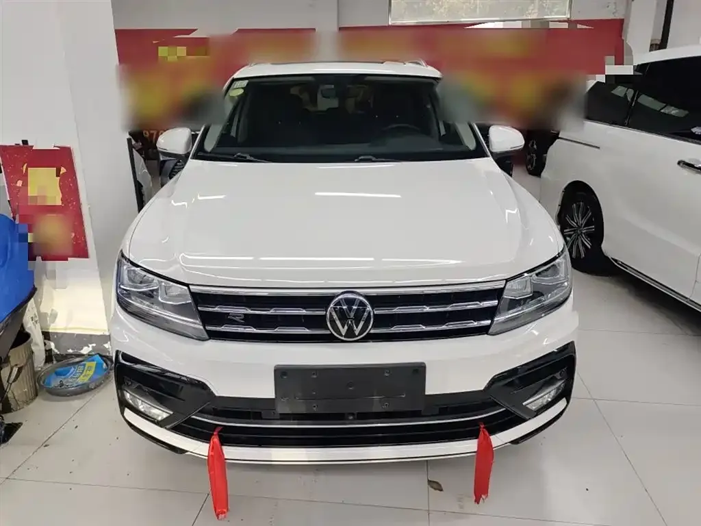 Volkswagen Tiguan L — фото 3