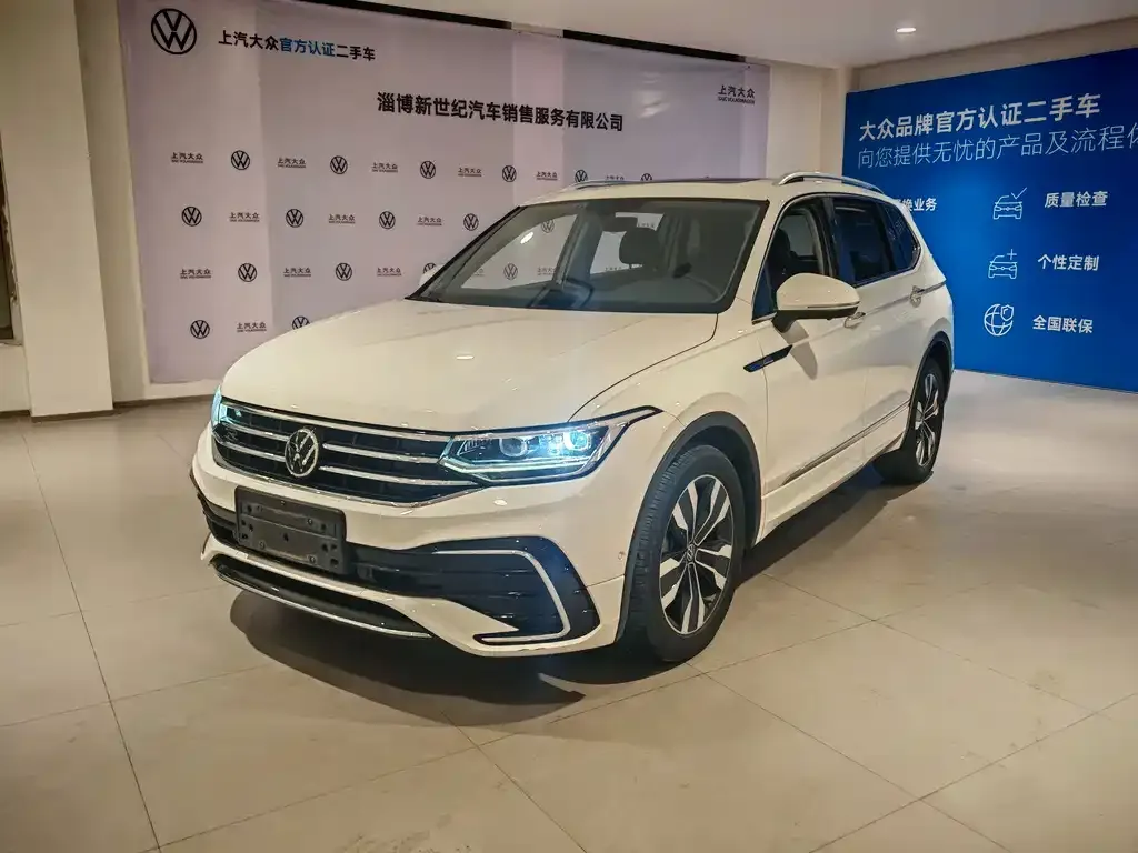 Volkswagen Tiguan L — фото 1