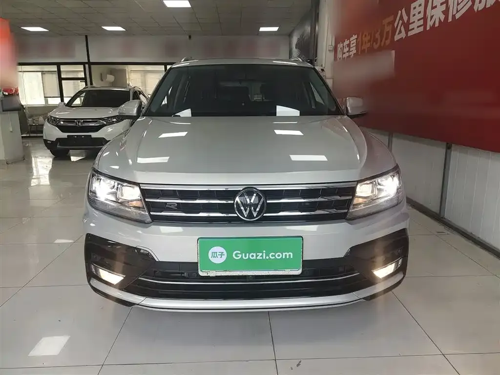 Volkswagen Tiguan L — фото 3