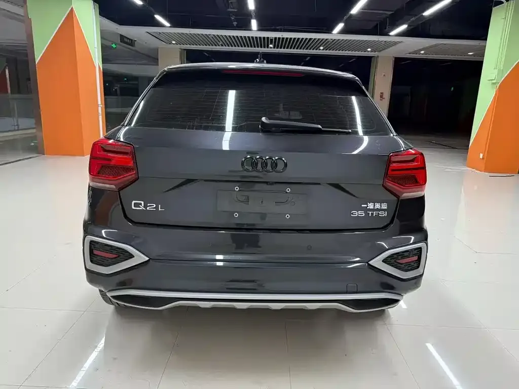 Audi Q2L — фото 10