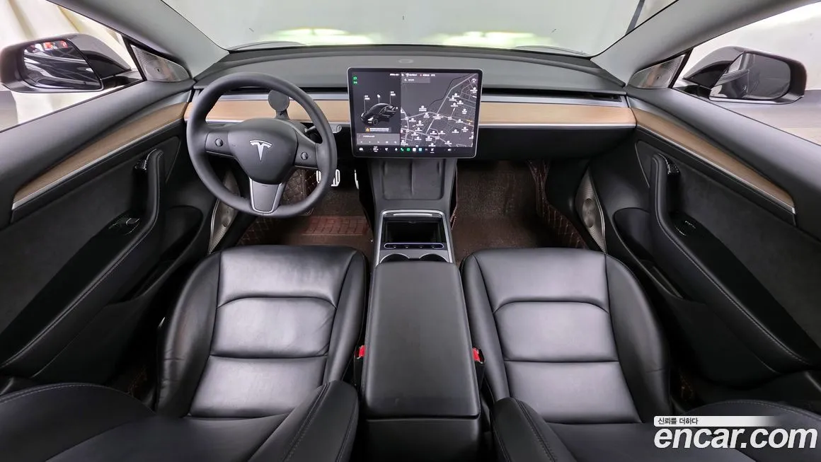 Tesla Model 3 — фото 7