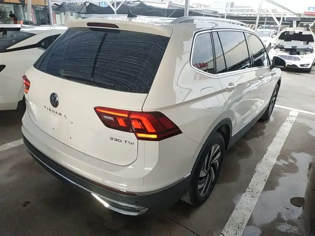 Volkswagen Tiguan L — фото 7