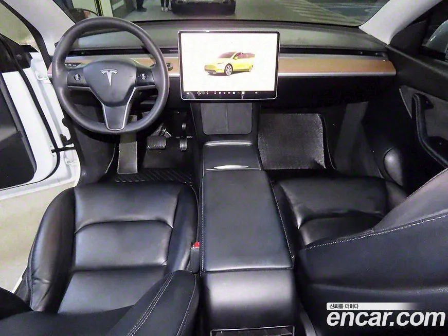 Tesla Model Y — фото 10
